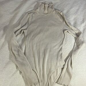 Long sleeve white turtleneck body suit